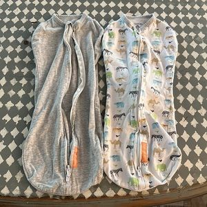 Set of 2 Swaddle Me Pod newborn swaddles. One gray one safari animals.